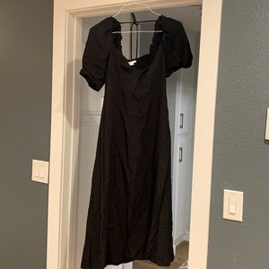 Puffed Sleeve Black Dress with twisted front detail